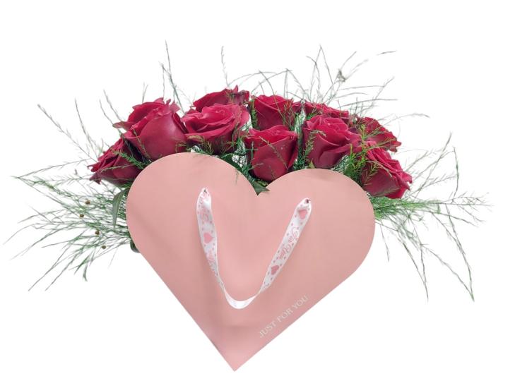 Red Roses in a Pink Heart Flower Bag